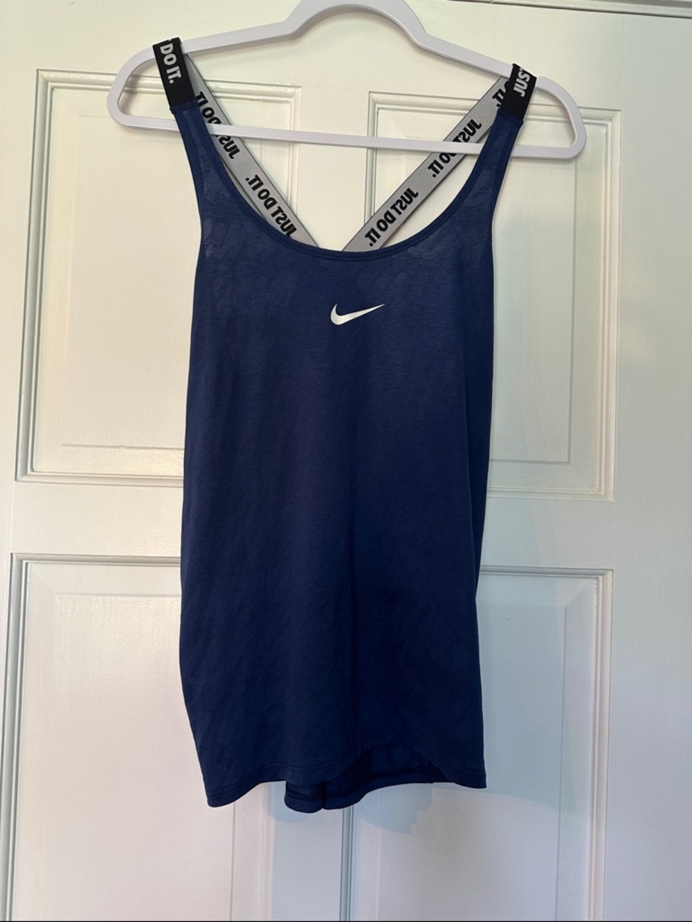 Nike Navy Dry Fit Running Tank Top with White Swoosh and Branded Straps.